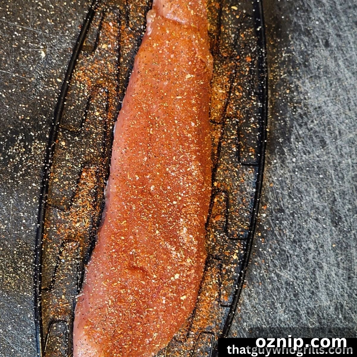 Salmon fillet on fish basket seasoned with seasoning