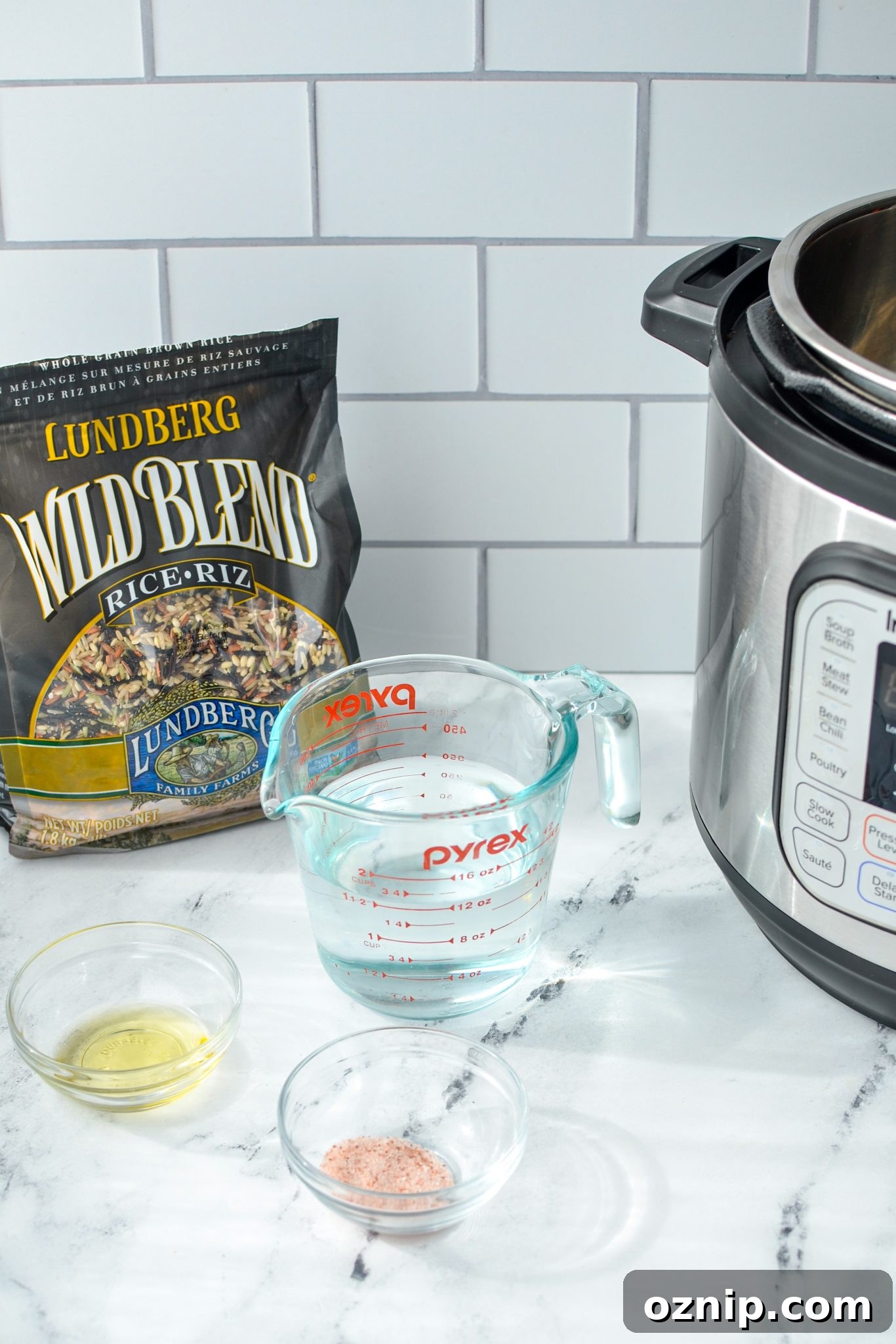 The ingredients needed to make Instant Pot wild rice: rice, water, oil, and salt.