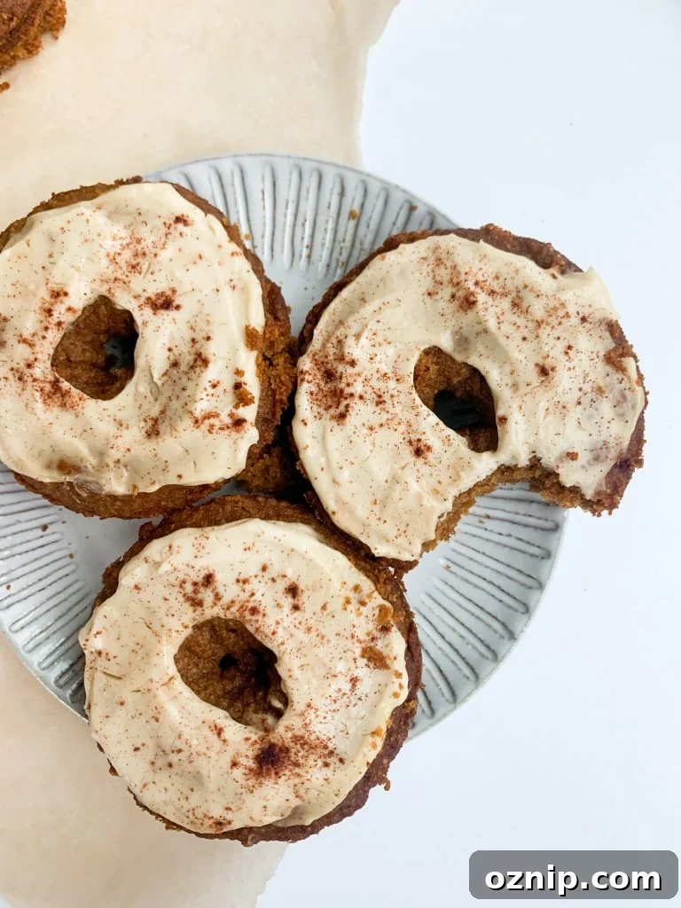 Fluffy Pumpkin Donuts with Cream Cheese Frosting 5 Tray of frosted pumpkin donuts