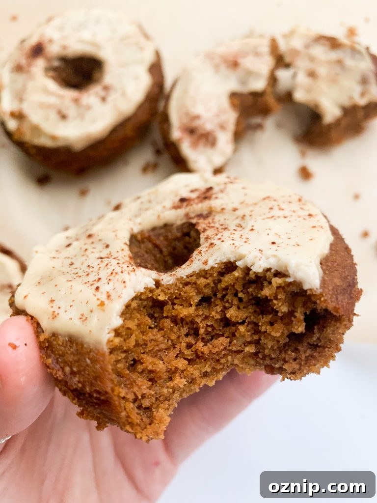 Fluffy Pumpkin Donuts with Cream Cheese Frosting 6 Stack of pumpkin donuts