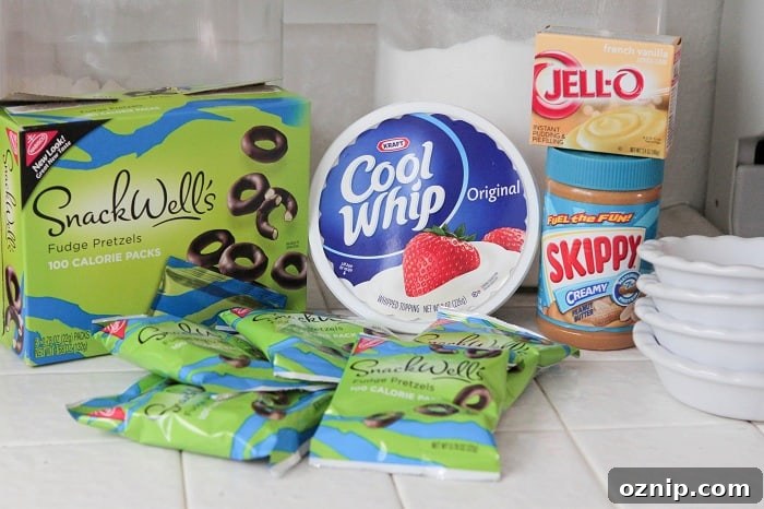 Ingredients for Cookie Crusted Peanut Butter Pretzel Pies Simple ingredients for mini peanut butter cookie pies