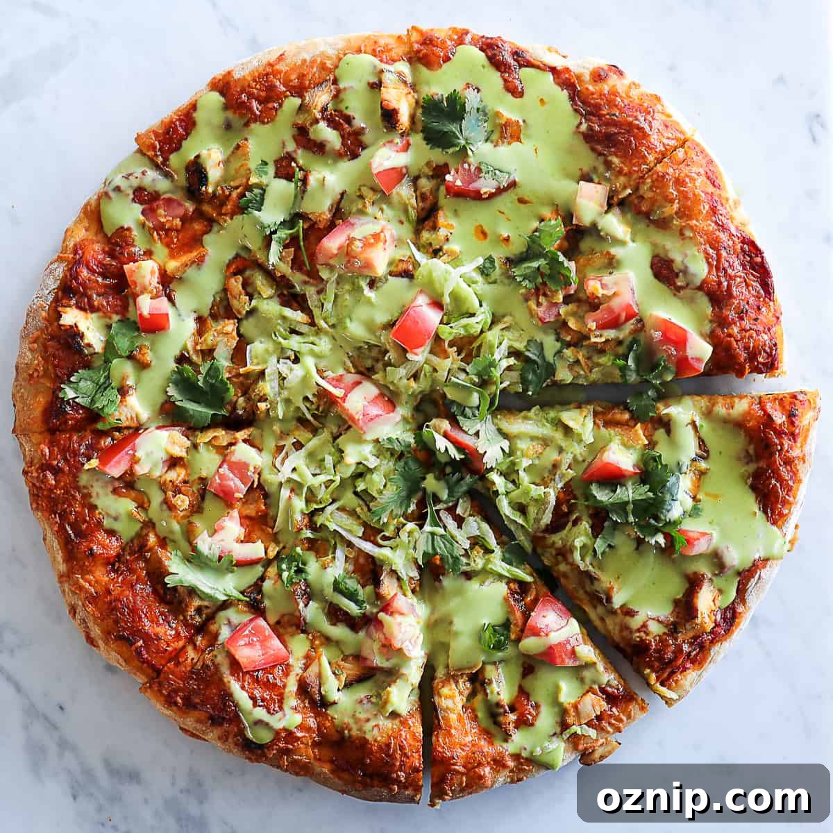 Tasty Chicken Taco Pizza Recipe With lettuce and diced tomatoes