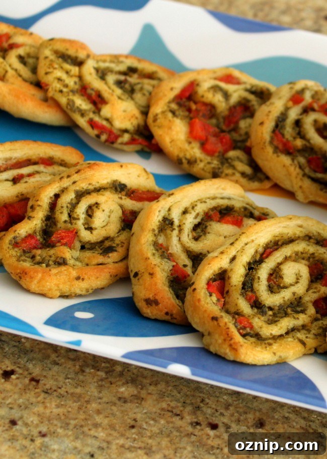 With just a few ingredients this Party Pesto Pinwheel recipe is easy to put together in a pinch - friends will love it!