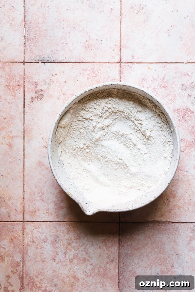 Moist Baked Pumpkin Donuts: Soft Fall Donut Recipe 5 A bowl with flour mixture.