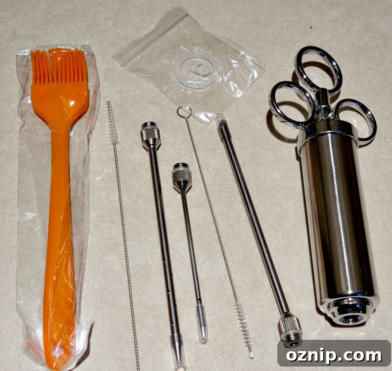 Jack Daniel's Smoked Turkey Brine Recipe 3 Metal Injector Pieces On Countertop