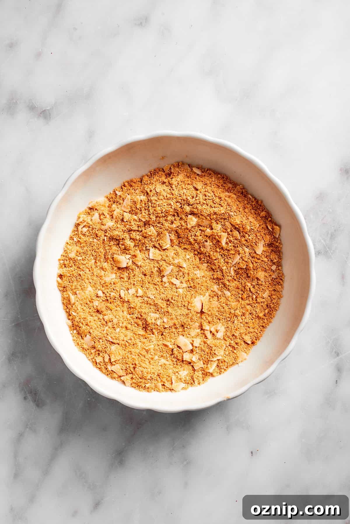 Graham cracker crust base in a bowl.