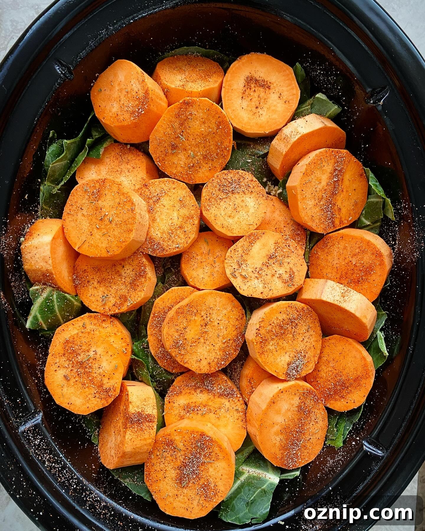 Slow Cooker Soul Food Dinner Recipes 4 overhead shot of uncooked soul food dinner in a black slow cooker