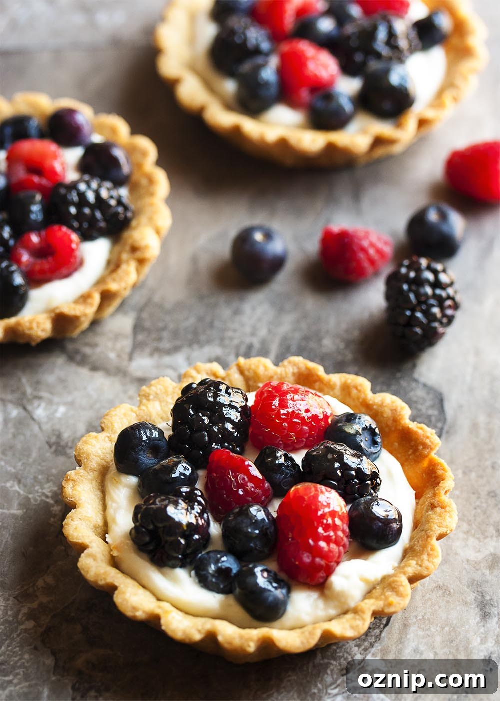 Mascarpone Fruit Tarts with Fresh Mixed Berries 4 Mini mascarpone fruit tarts topped with mixed berries