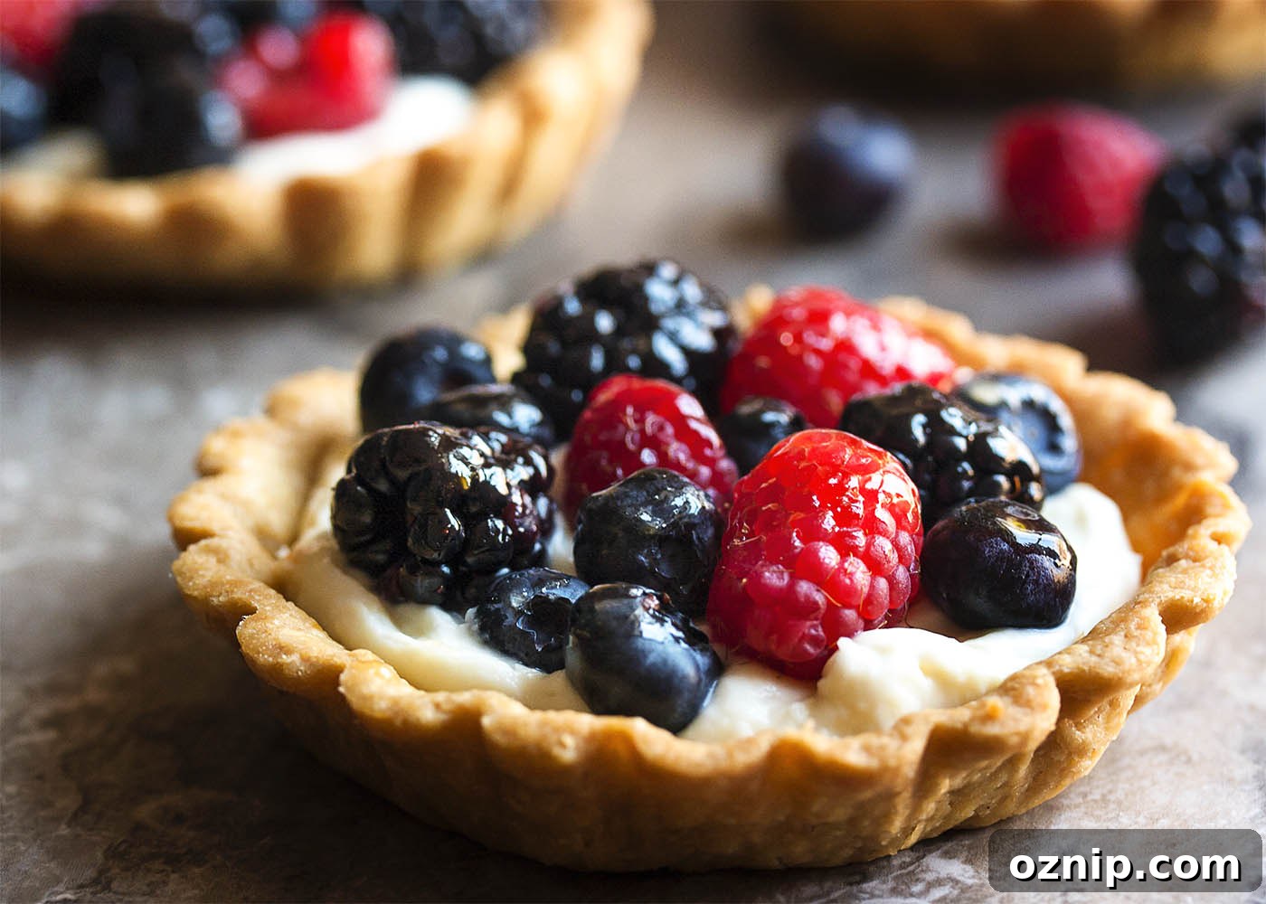 Mascarpone Fruit Tarts with Fresh Mixed Berries 5 Mascarpone fruit tart with mixed berries and apricot jelly glaze