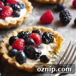 Mascarpone Fruit Tarts with Fresh Mixed Berries 6 Mascarpone fruit tart with mascarpone cheese filling and mixed berries