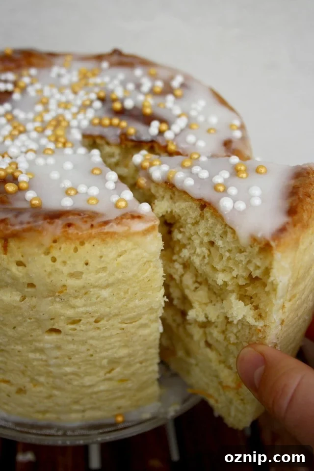 Kulich - Sweet Russian Easter Bread Taking One Piece Away