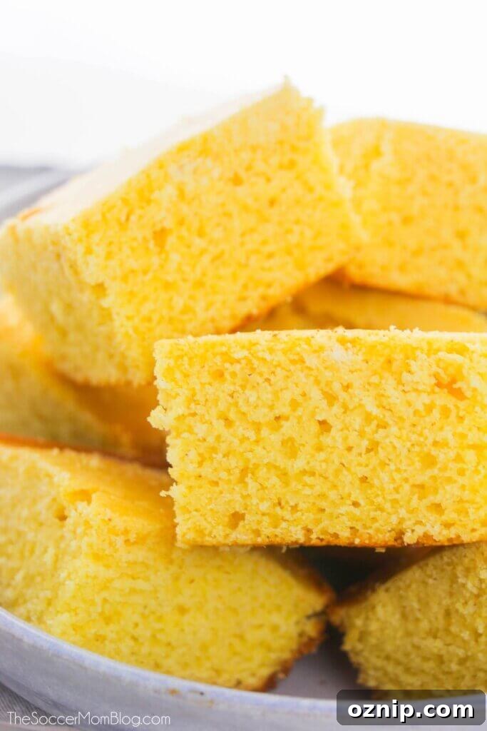 Classic Sweet Northern Style Cornbread 2 Fresh Homemade Cornbread piled on a plate
