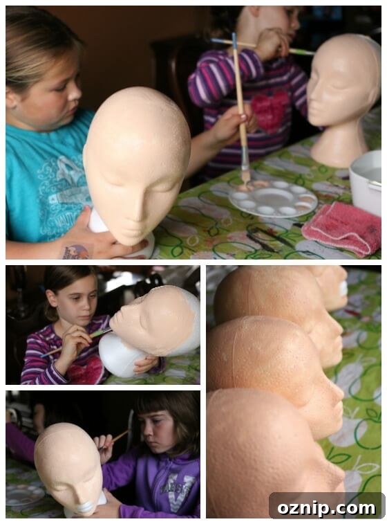 Styrofoam Head Self Portrait Art Project for Kids 6 kids painting styrofoam heads with acrylic craft paint