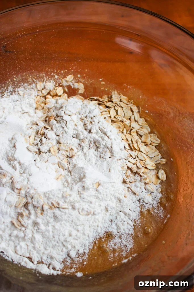 Adding flour and oats