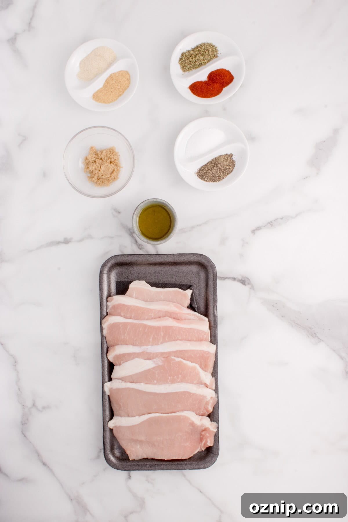 Ingredients to make seasoned pork chops in the air fryer.