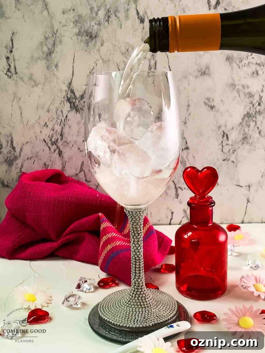 Valentine's Gin Cocktail Recipe for a Romantic Evening 6 Top the gin filled glass with prosecco.