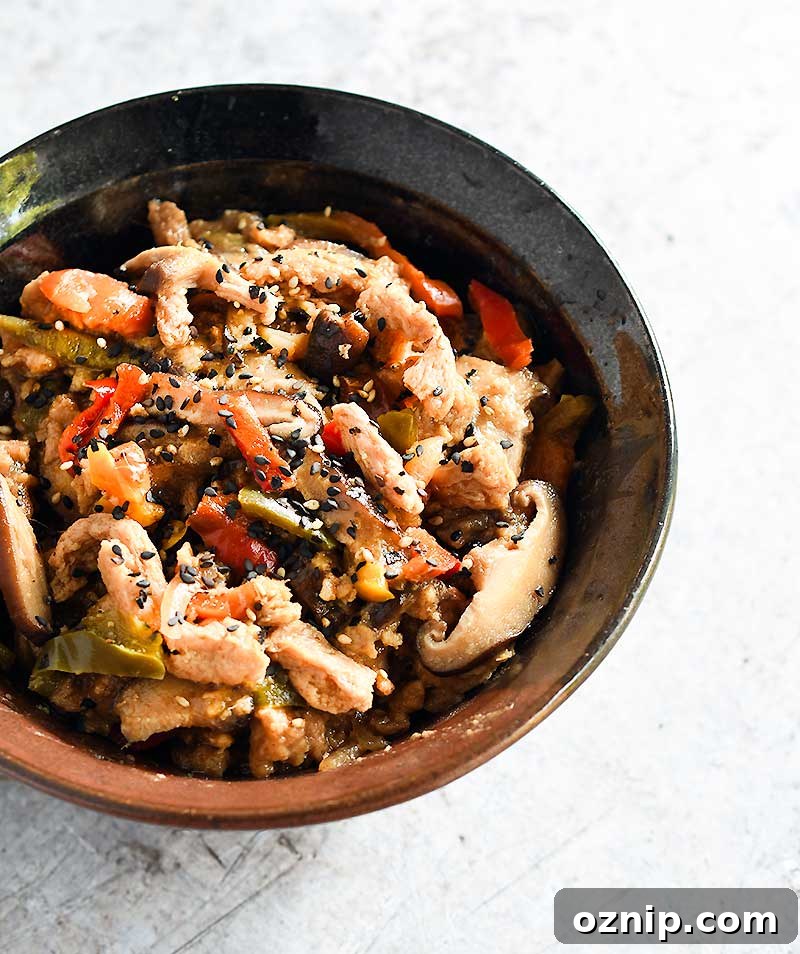 Date Sweetened Teriyaki Soy Curls in a brown ceramic bowl