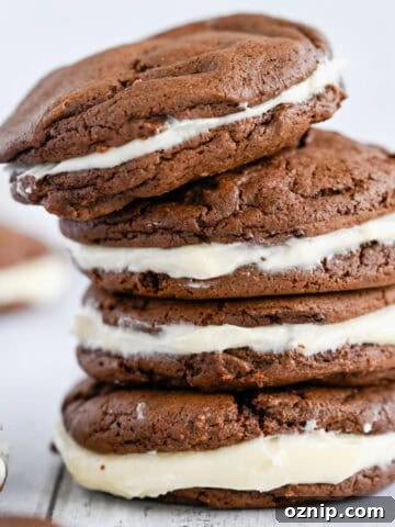 Homemade oreos in a stack.