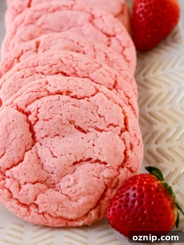 Strawberry cookies made with cake mixed stacked together.