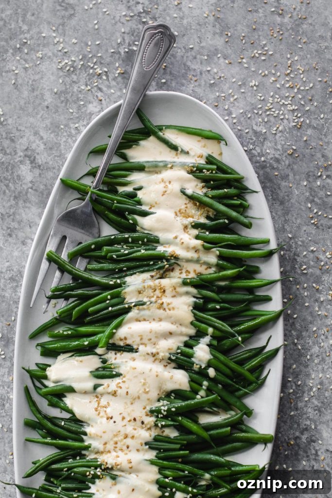 Plant-Based Thanksgiving Sides Your Guests Will Love 11 Dijon Tahini Green Beans by Flora & Vino