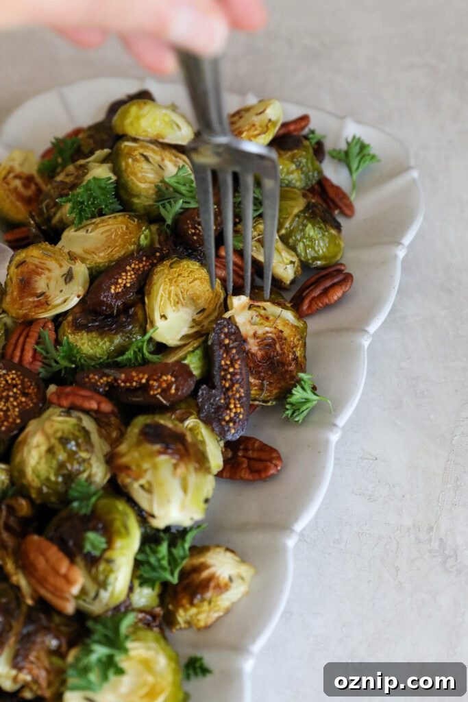 Plant-Based Thanksgiving Sides Your Guests Will Love 15 Roasted Brussels Sprouts with Figs & Pecans by Flora & Vino