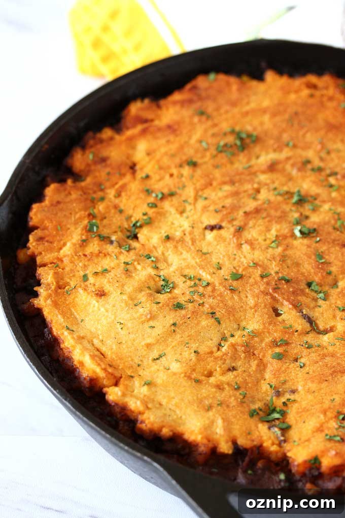 Tamale pie out of the oven has a golden cornbread topping