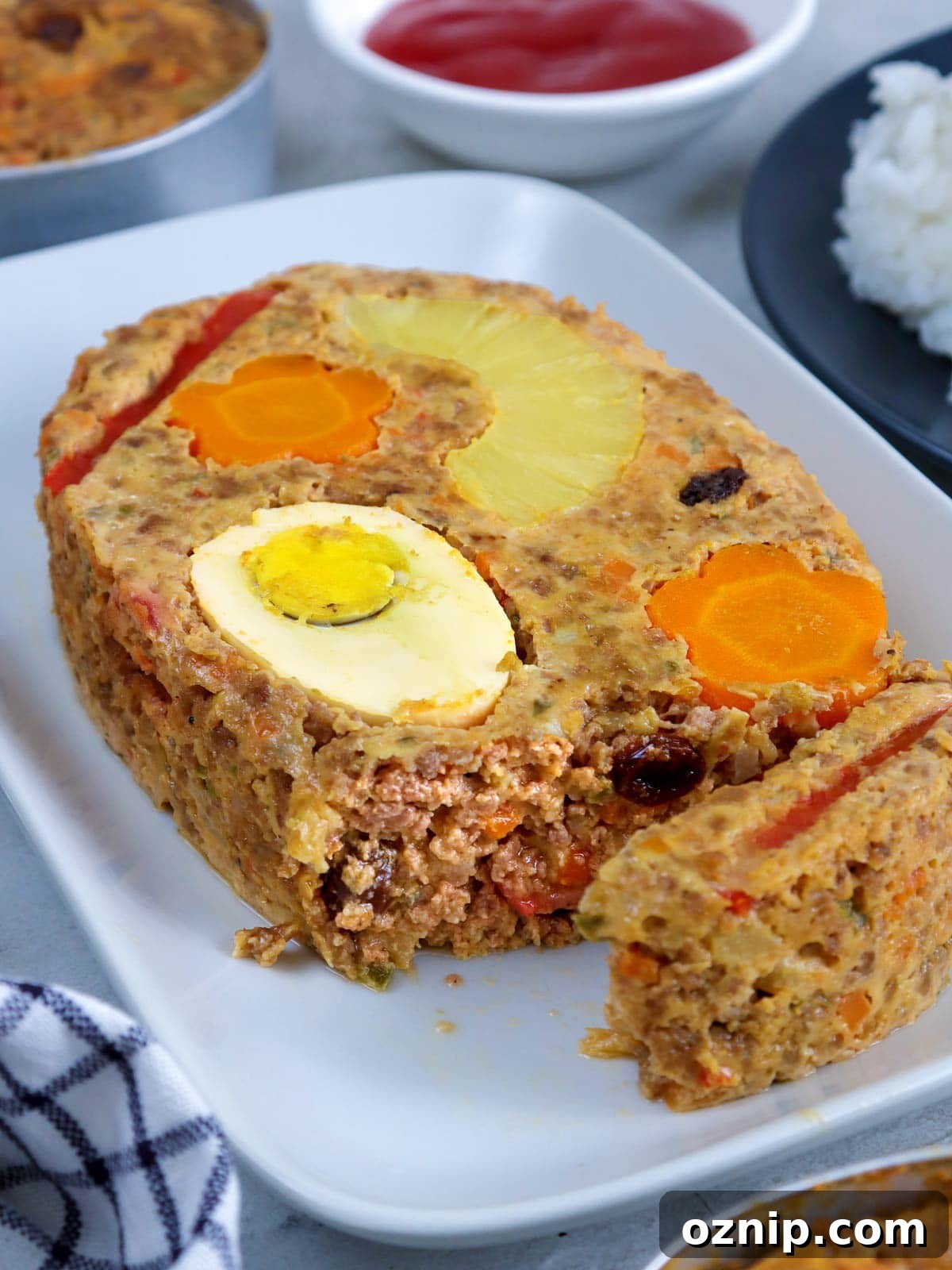 Discover Marikina's Timeless Shoe-Making Legacy 7 serving a slice of Marikina meatloaf from a platter
