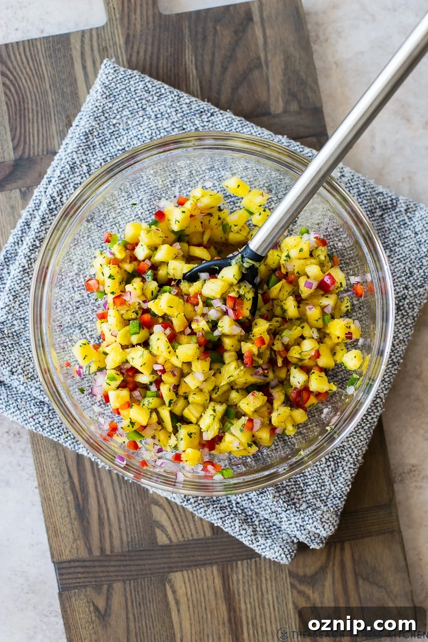 Grilled Hawaiian Huli Huli Chicken with Pineapple Salsa 6 Overhead photo of a glass bowl of pineapple salsa
