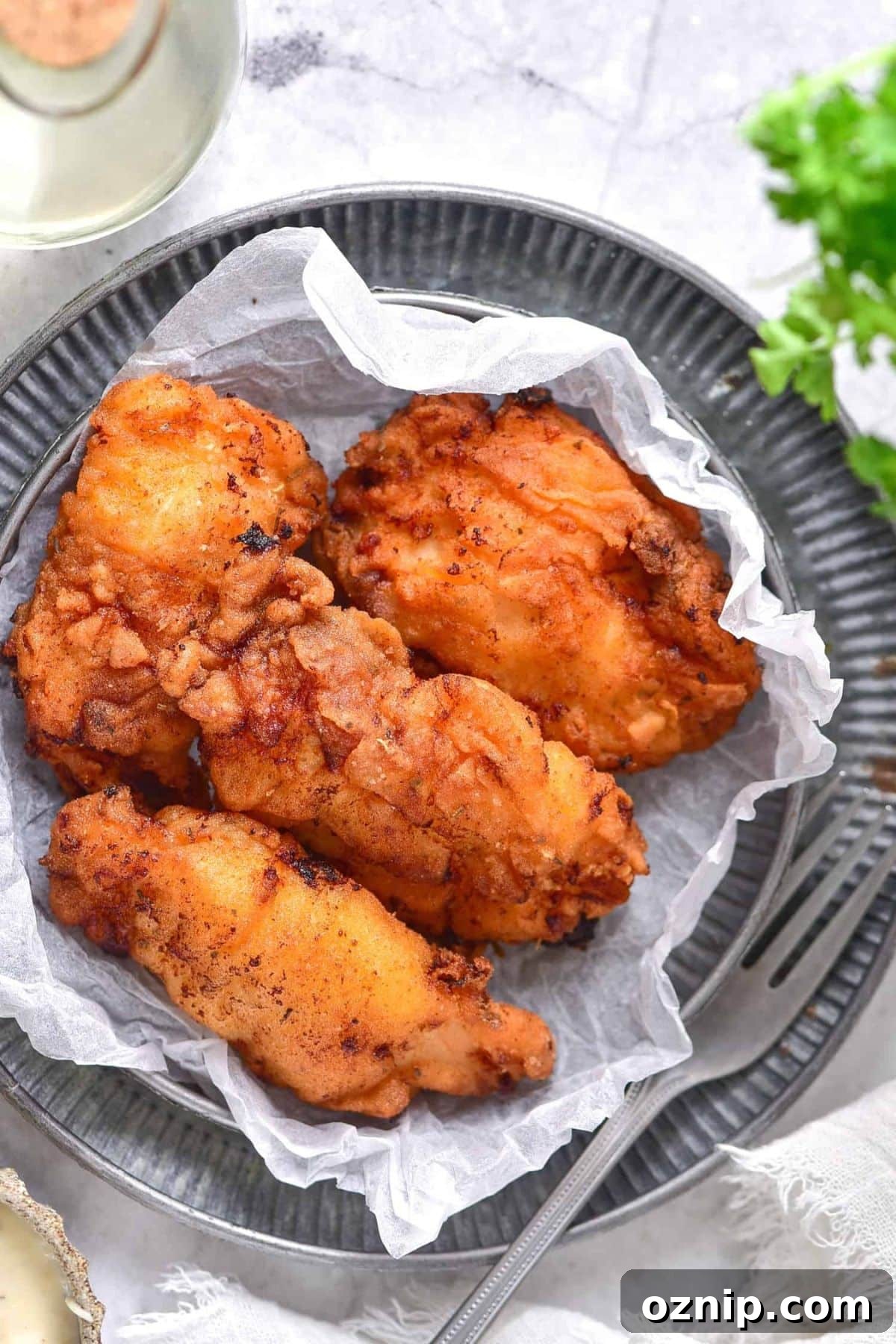 Gluten and Dairy Free Fried Chicken Recipe A plate of gluten and dairy-free fried chicken.