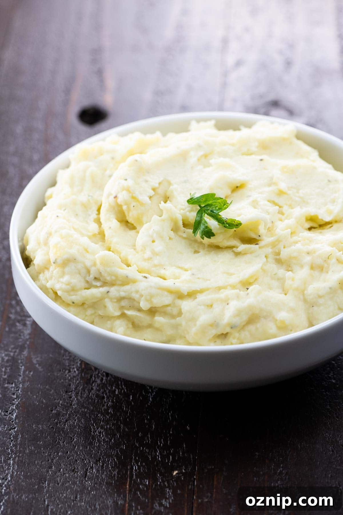 boursin mashed potatoes in a white serving bowl
