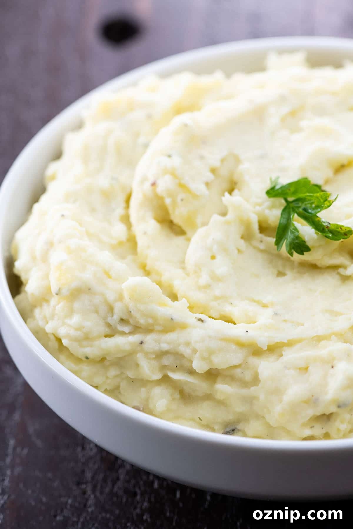 boursin mashed potatoes in a white serving bowl