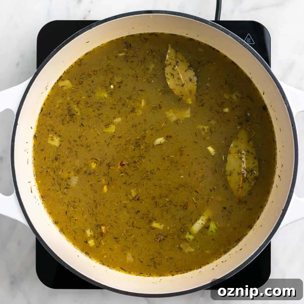 Hearty Vegan Split Pea Soup Recipe 5 Split pea soup ingredients mixed in a pot.