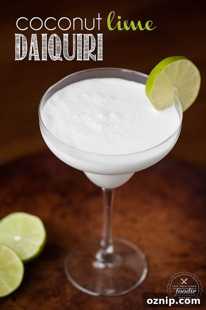 Coconut rum blended daiquiri with lime on glass