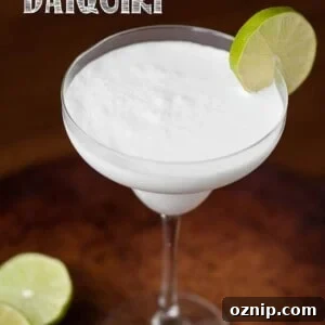 Blend up this three ingredient Coconut Lime Daiquiri. It's simple to make and in minutes you'll have a tasty, tart, & refreshing tropical cocktail.