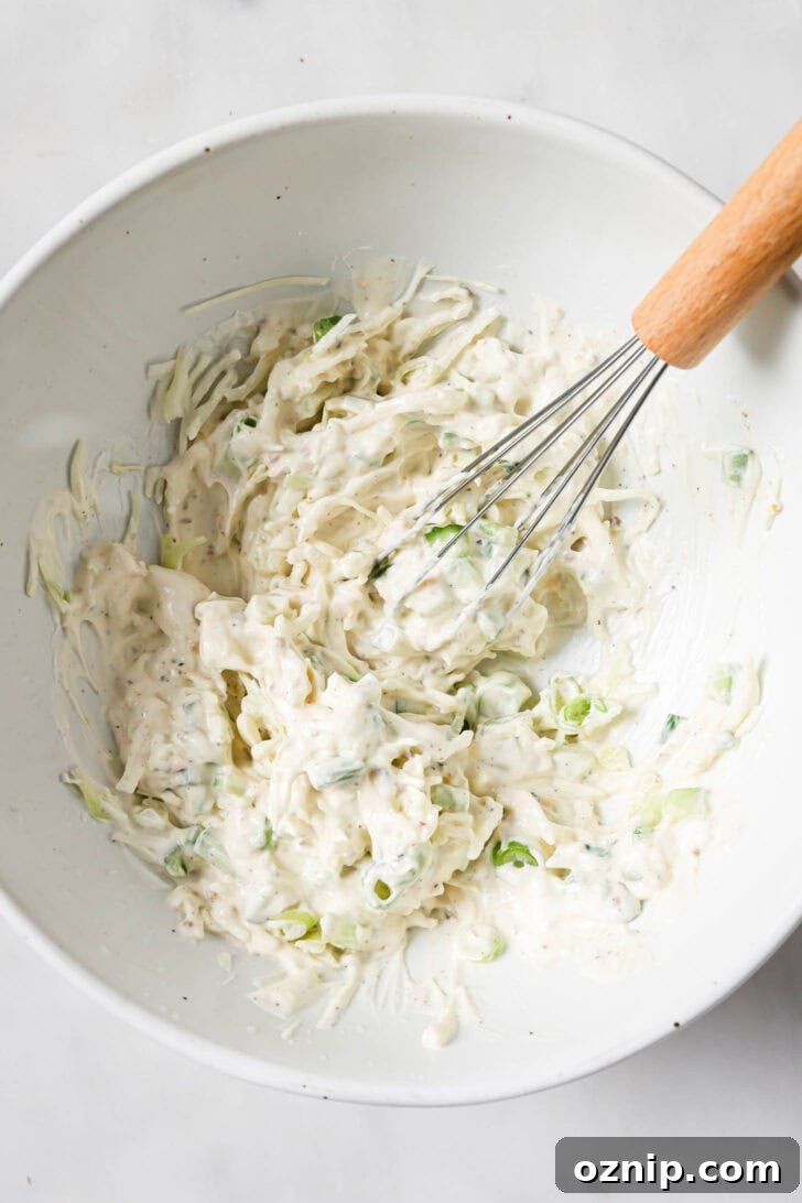 Chopped vegetables added to mayo mixture and whisked for Chicken Sandwiches.