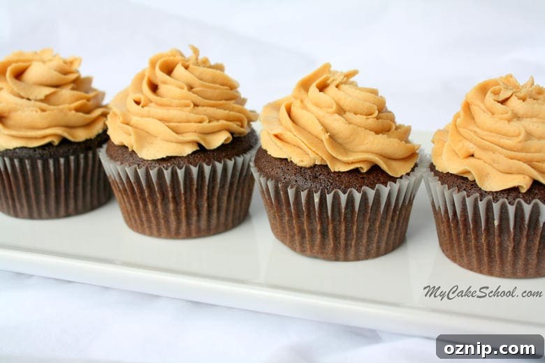 This Peanut Butter Buttercream Frosting is so Creamy and Flavorful! Perfect for chocolate cakes and cupcakes! The BEST Peanut Butter Buttercream Frosting Recipe by MyCakeSchool.com! Tastes amazing with chocolate cakes and cupcakes! MyCakeSchool.com online cake tutorials, recipes, videos, and more!