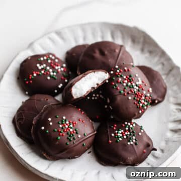 Chocolate peppermint patties on a white plate.