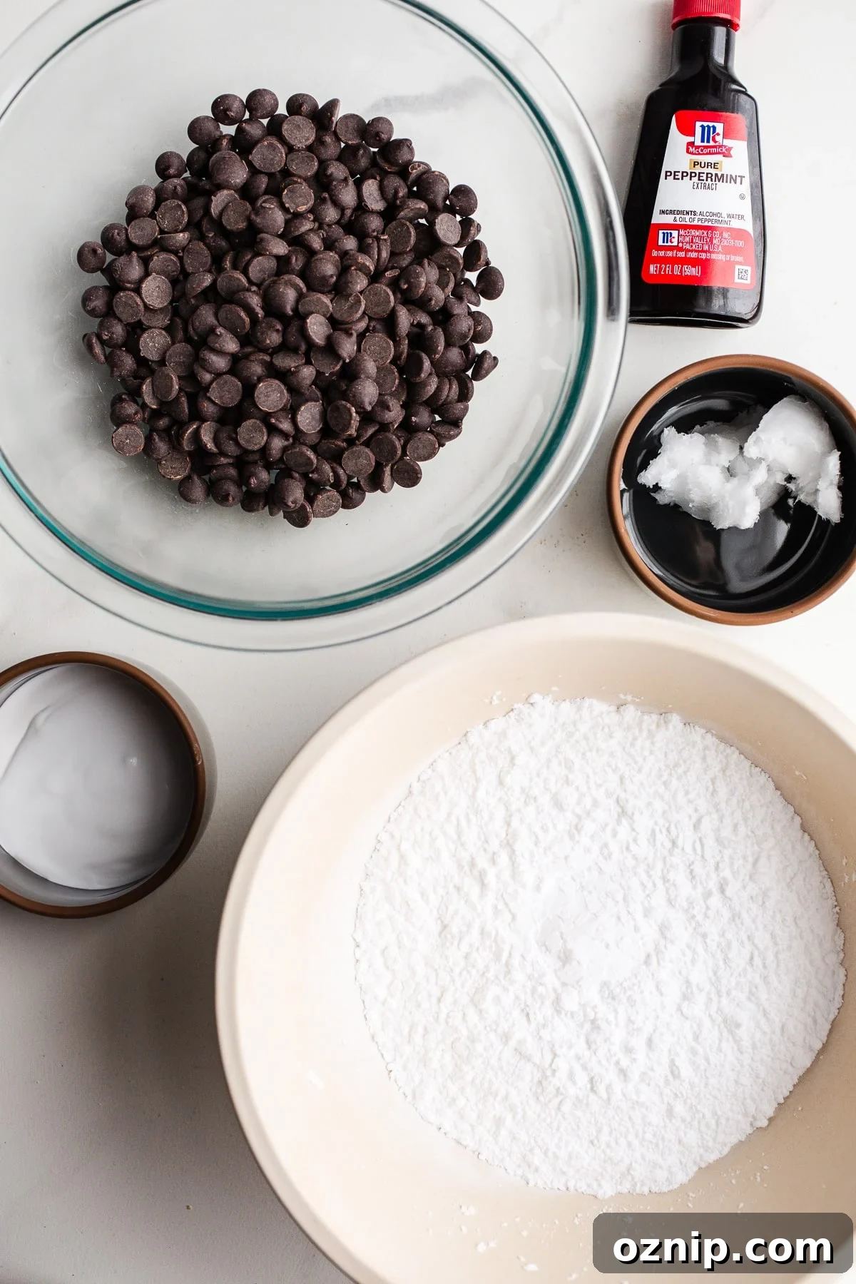 Ingredients to make peppermint patties in bowls.