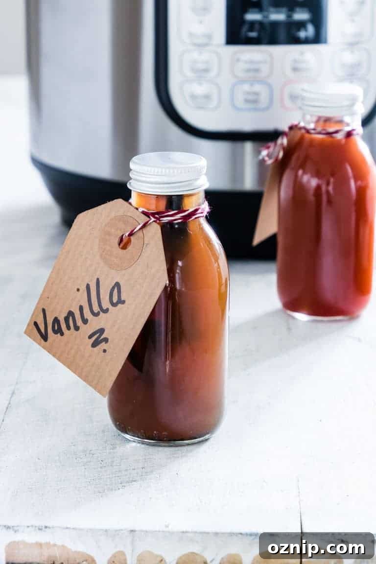 The completed Instant Pot Vanilla Extract packed in individual bottled and tied with handwritten gift tags