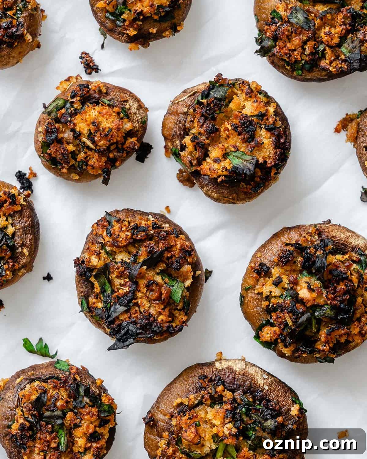 completed Easy Vegan Stuffed Mushrooms on a white surface