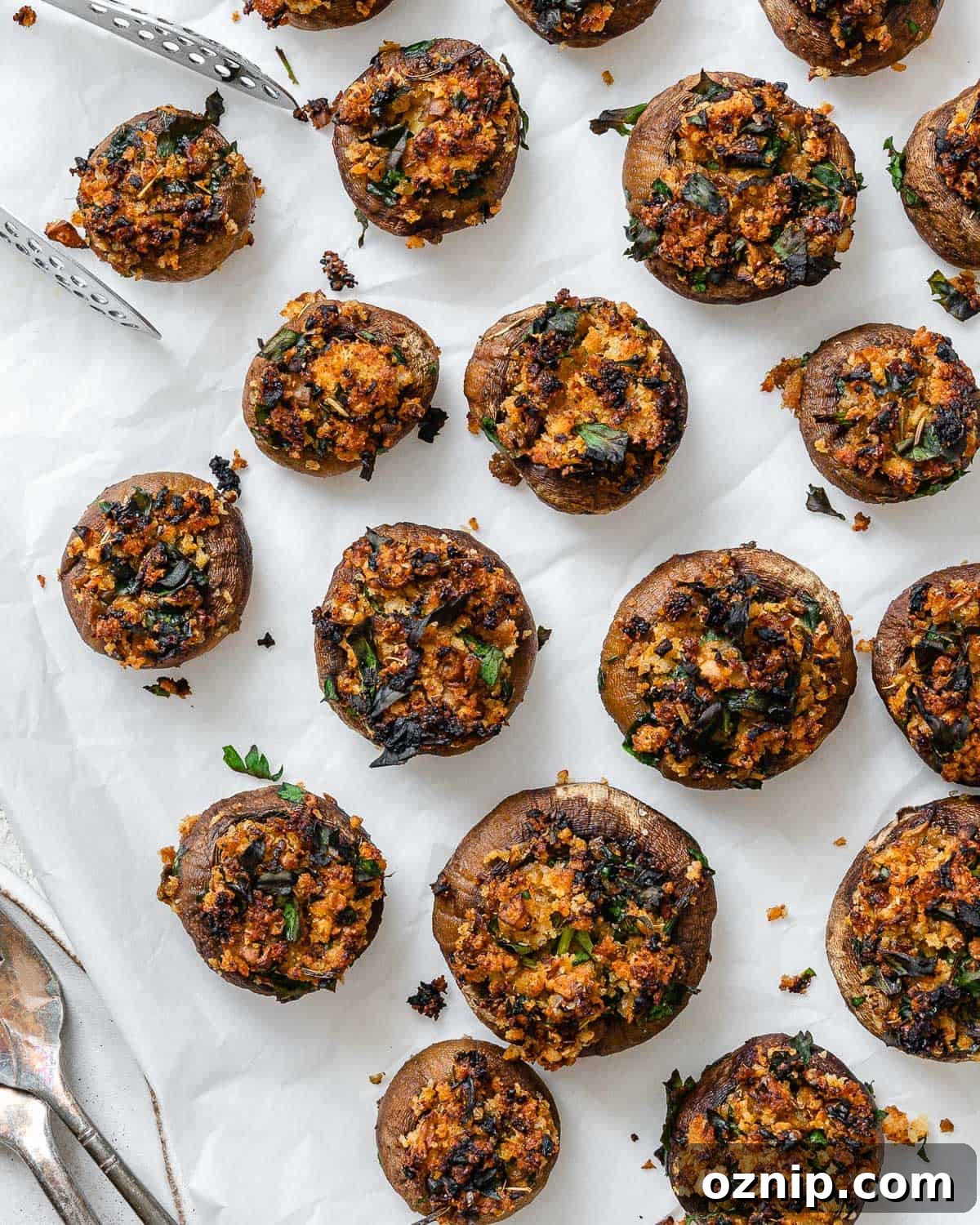 completed Easy Vegan Stuffed Mushrooms on a white surface