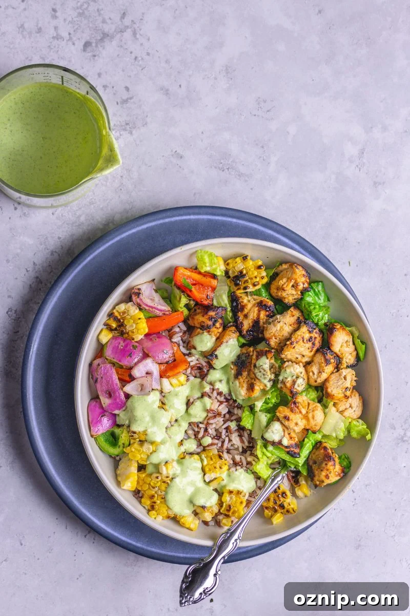 Greek Chicken Kebab Bowl with Tzatziki and Lemon Rice 2 chicken on skewers