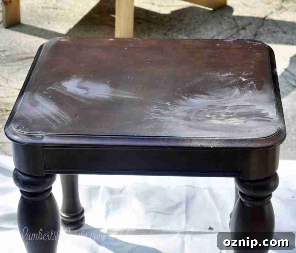sanded parts of a wood table.