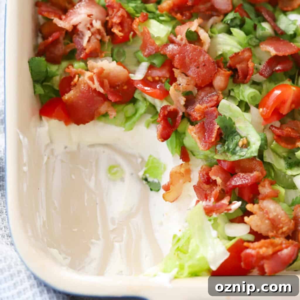 blt dip with bacon on top, an easy bacon appetizer, most popular 4th of july food