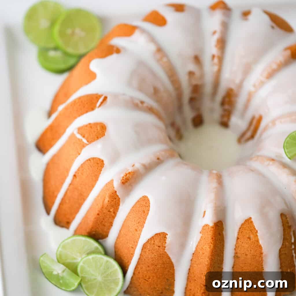 key lime pound cake recipe with limes on a serving platter