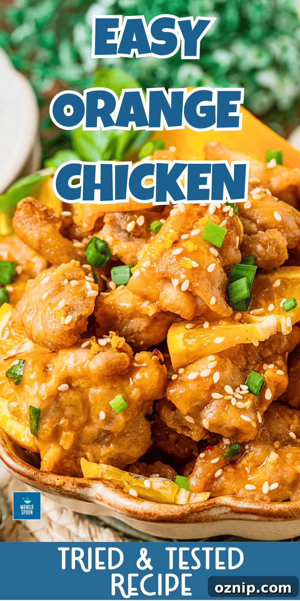 Final shot of golden, saucy Orange Chicken.