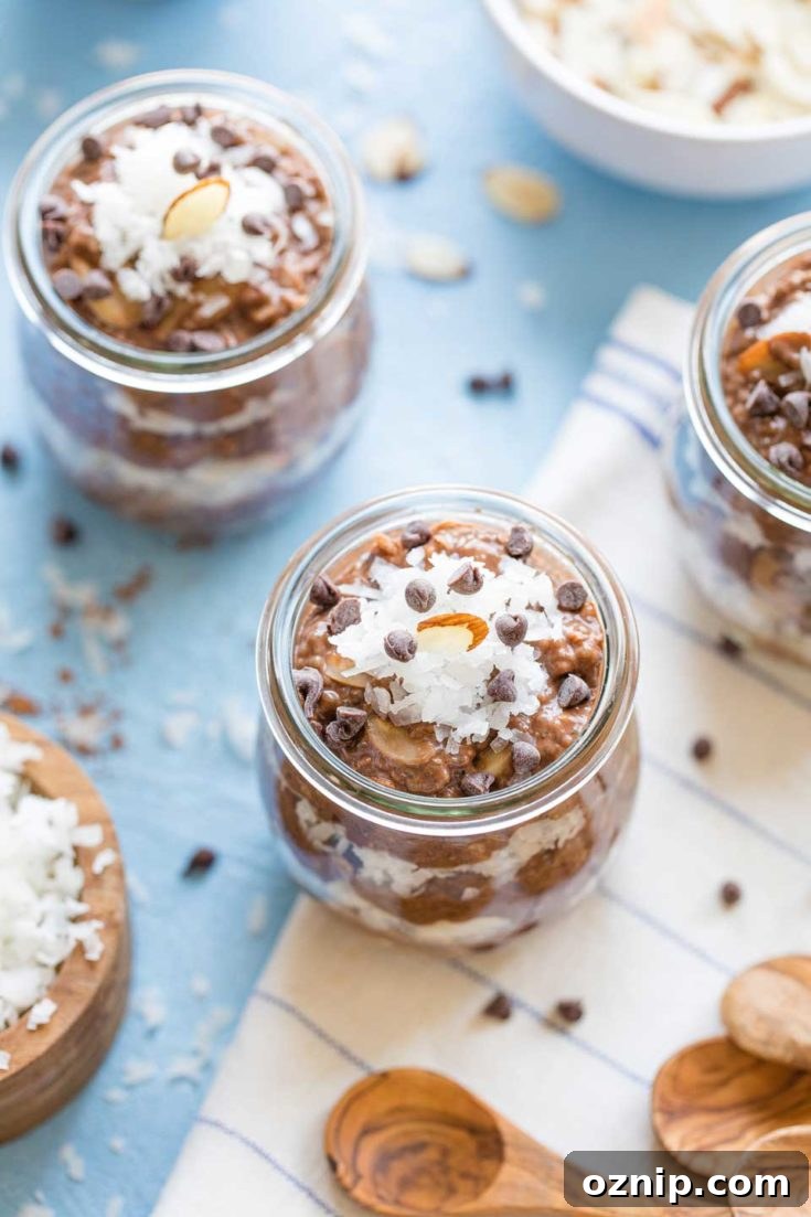 Top 10 Recipes of 2021: Most Popular Dishes Revealed 9 Several glass jars of chocolate chia pudding with chocolate chips around.