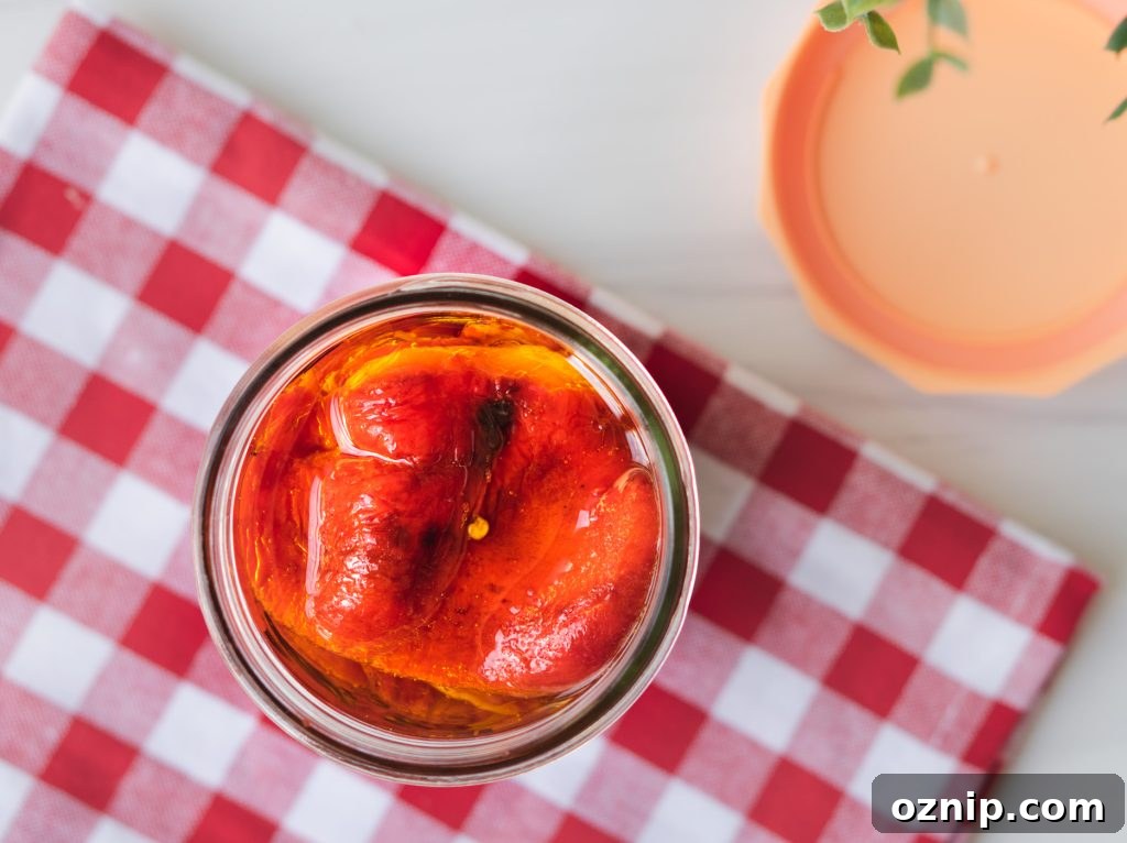 Homemade Roasted Red Peppers Recipe 3 top down shot of roasted peppers in a jar
