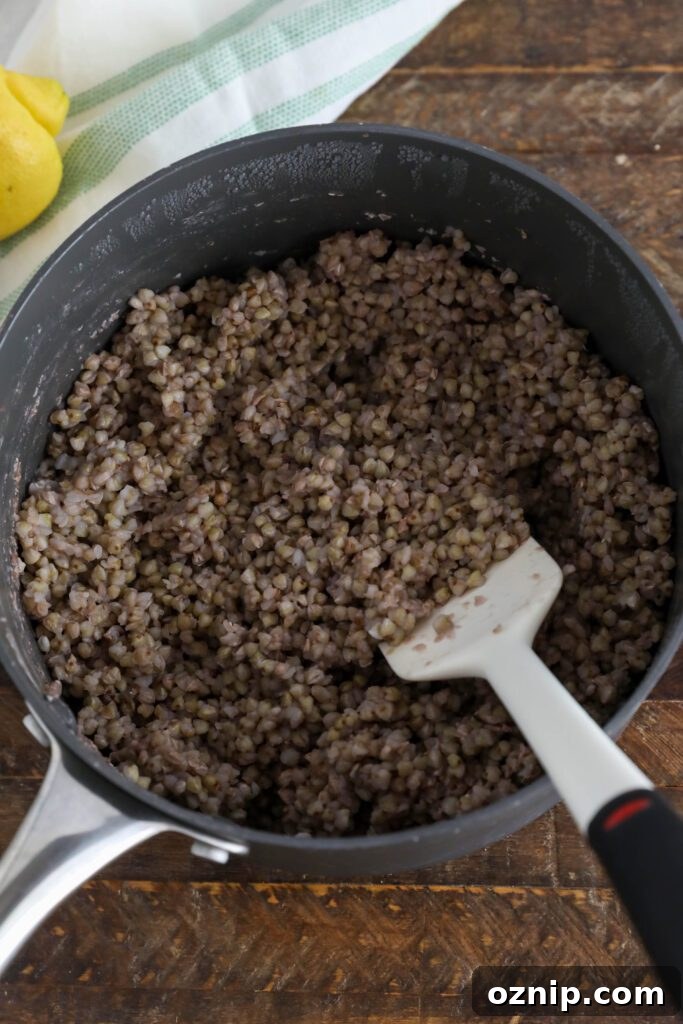 buckwheat cooked in pot with spatula
