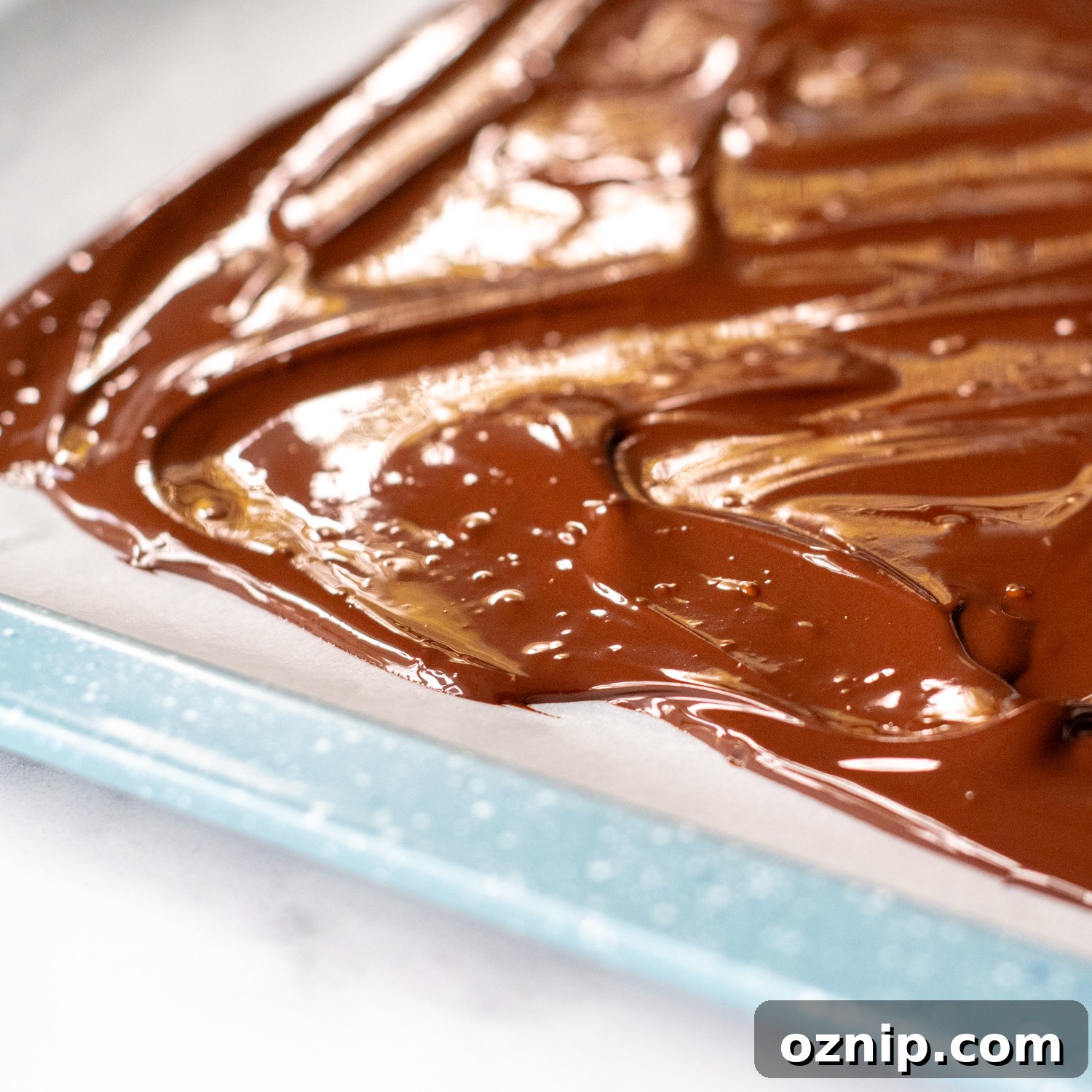 melted chocolate spread on a baking sheet.